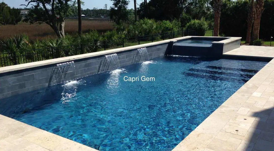 Pool with a Capri glass-bead finish, modern pool with raised spa and spillway