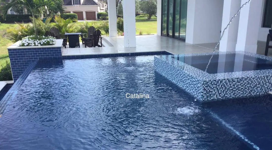 Pool with a Catalina glass-bead finish, contemporary pool with glass-tile accents