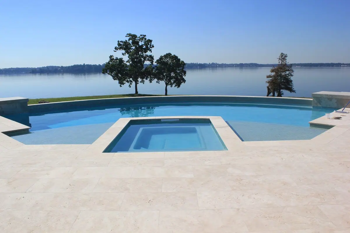 Waterfront pool with Super Blue finish and attached spa